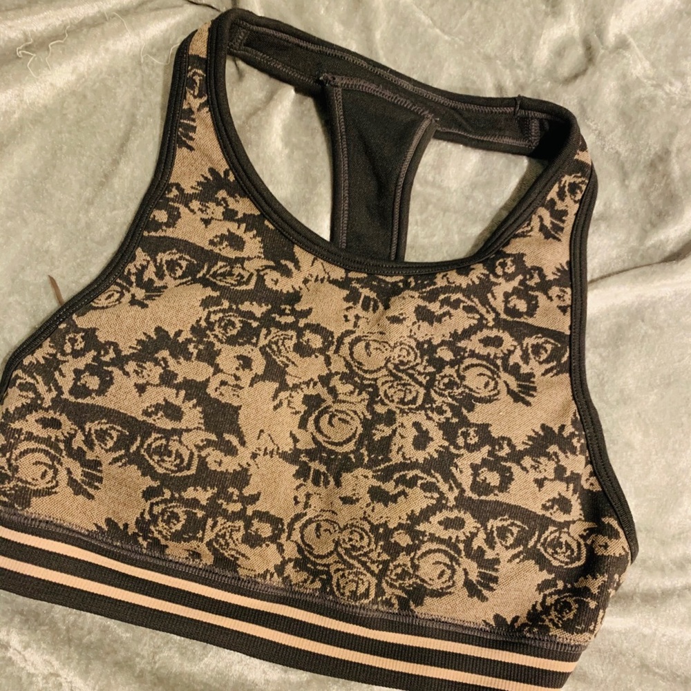 Pink and grey light impact sports bra